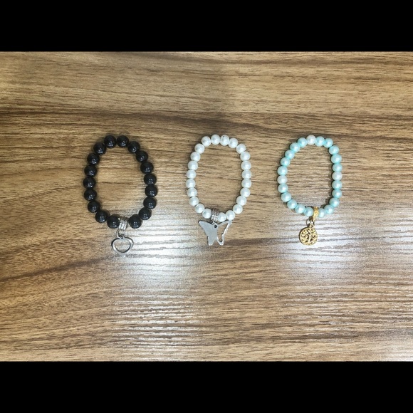 Three beaded bracelets with pendants - Picture 1 of 4